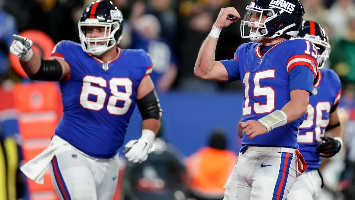 “Remontada Épica de los Giants: DeVito Conecta con Robinson para Derrotar a los Packers”